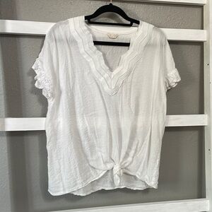 White hem and thread top